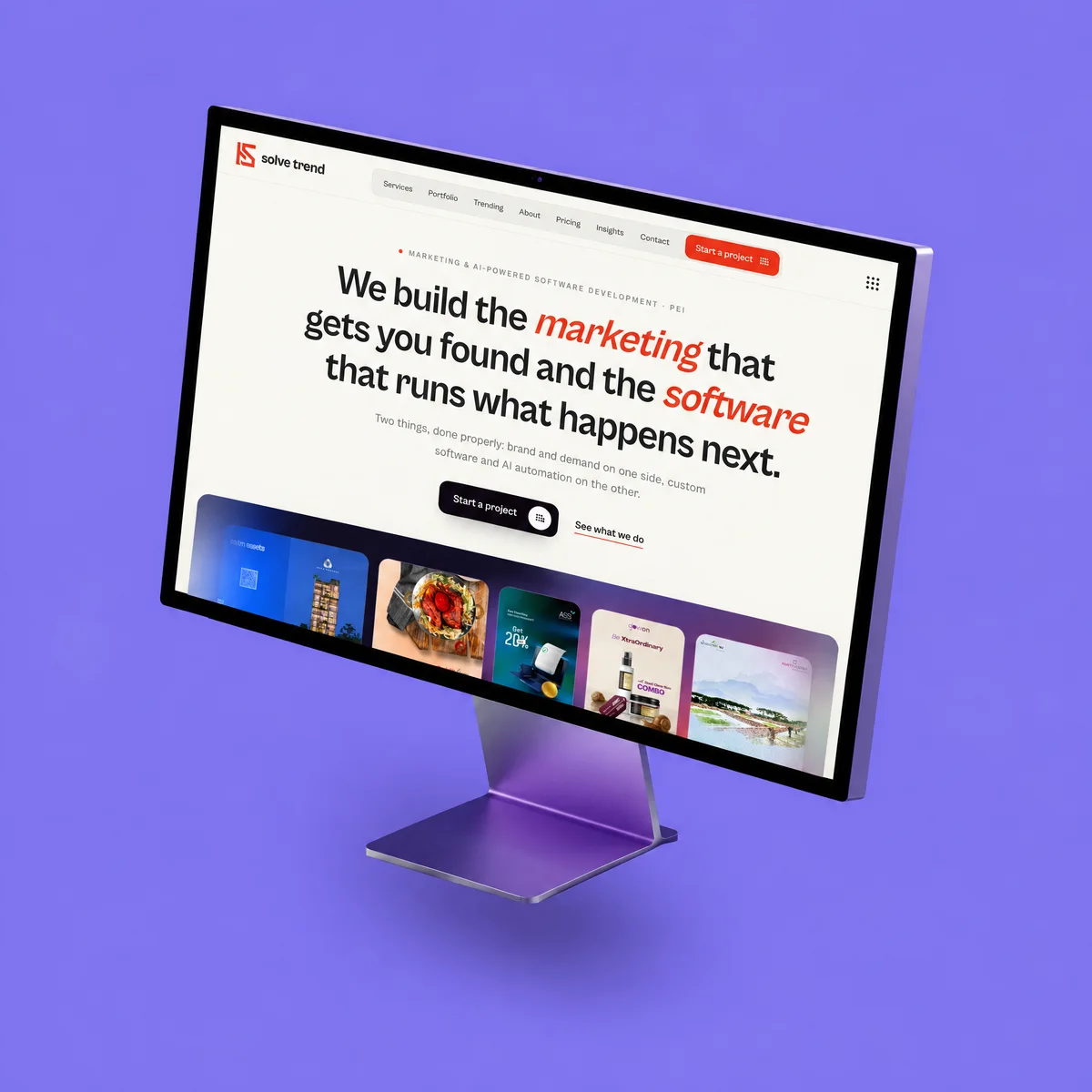 Desktop monitor showing a marketing website home page against a flat violet backdrop